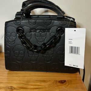 Betsey Johnson black skulls purse